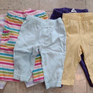 Five pairs of girls pants, size 6-12 months